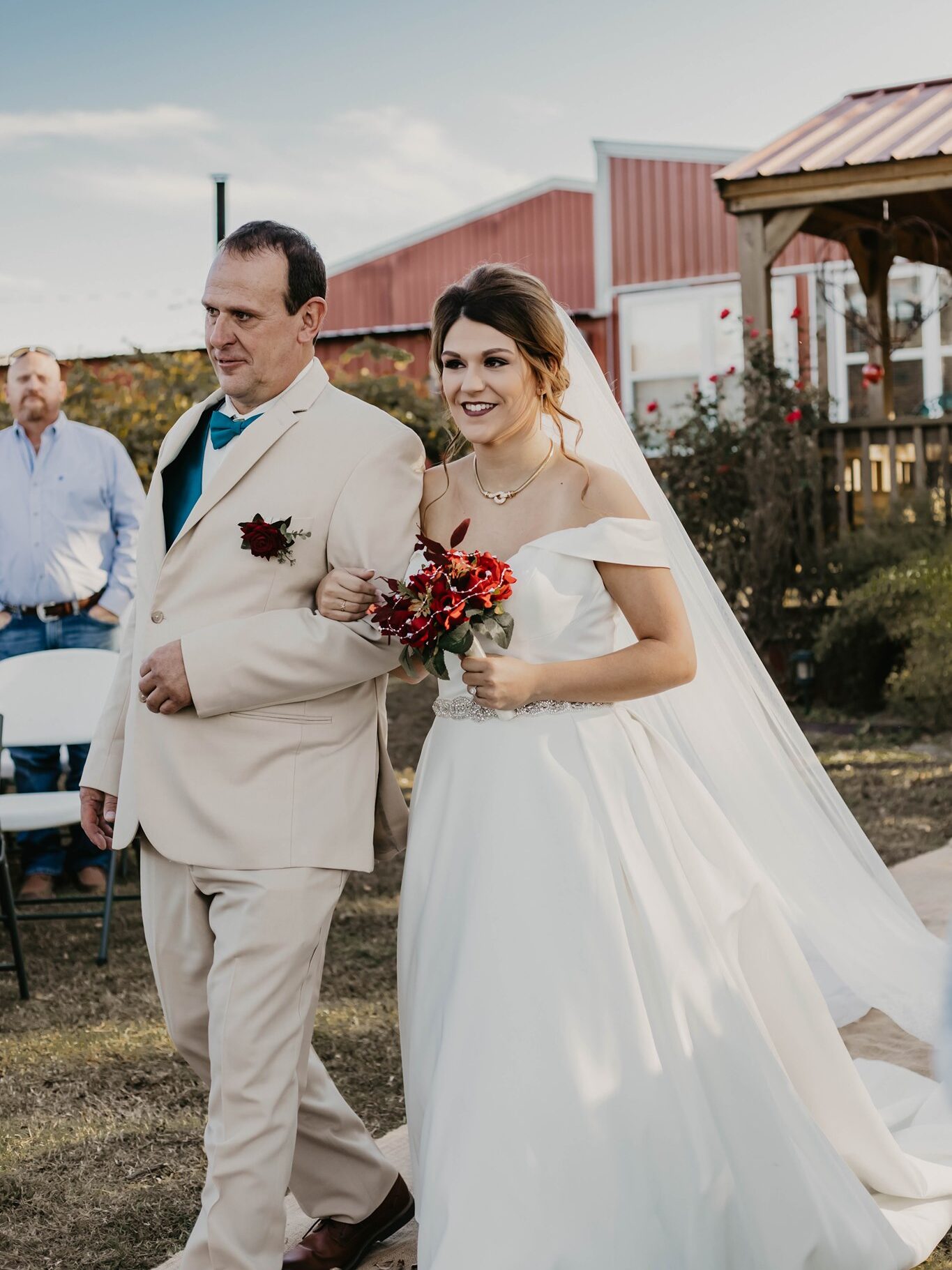 father walking bride down the aisle